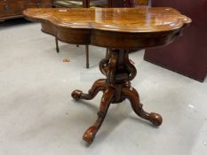 19th cent. Walnut card table, the serpentine shaped fold over swizzle top supported by a shaped