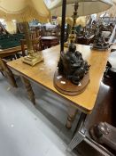 20th cent. Pine kitchen table with one central drawer, on turned supports. 47ins. x 31½ins.