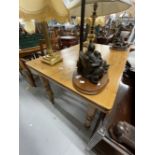 20th cent. Pine kitchen table with one central drawer, on turned supports. 47ins. x 31½ins.