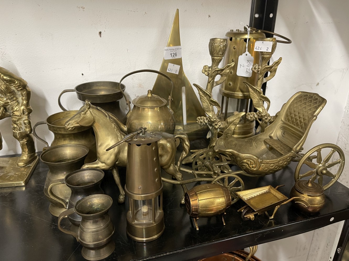 Brassware: Five graduated tankards, horse and carriage figure, two reproduction miners lamps, yacht, - Image 2 of 2