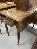 19th cent. Mahogany William IV Pembroke table on reeded supports with one drawer plus dummy.