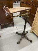 19th cent. Music stand, mahogany with brass fittings on cast iron lions paw stand.