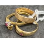 Hallmarked Jewellery: Three 18ct gold rings, one plain band, one set with a ruby, and one set with