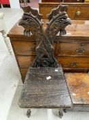 19th cent. Rooster carved back hall chair with pine seat.