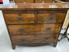 19th cent. Mahogany chest of 2 over 3 drawers on swept bracket supports. 34ins. x 16ins. x 31ins.