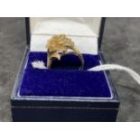 Hallmarked Jewellery: 9ct. gold dress ring, the head in the form of a rose. Weight 5.5g.