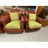 20th cent. Brown leather club armchairs, Thomas Lloyd, with squab fabric cushions. A pair.