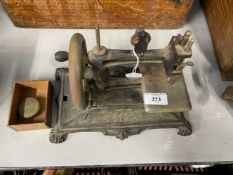 Sewing: Muller No. 4 Child's cast iron sewing machine, black Japanned with gilt decoration, marked