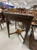 19th cent. Mahogany envelope games table with decorated frieze and legs. 22ins.