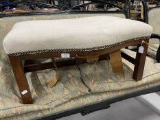 19th cent. Oak serpentine front footstool, lined, seated webbing and stuffing require restoration.