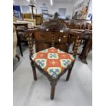 Early 20th cent. Carved oak corner chair with bobbin turned legs, upholstered carpet seat, the