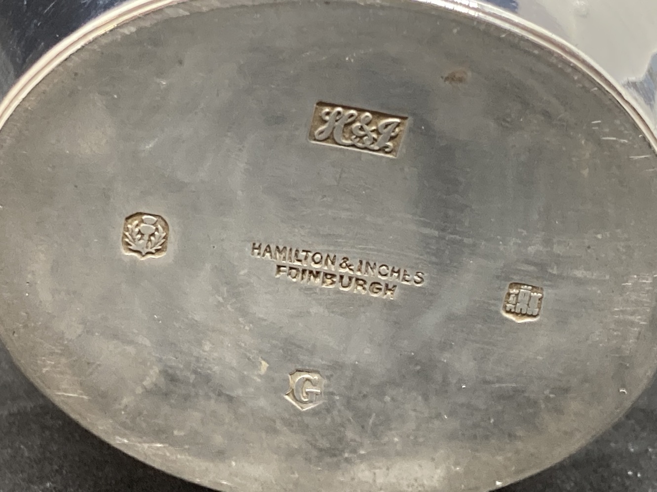 Hallmarked Silver: Cream jug, reed pattern handle, hallmarked Edinburgh. Weight 3.8oz. - Image 2 of 2