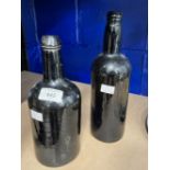 19th cent. Green wine/ale bottles. 11ins. and 10ins.