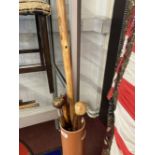 20th cent. Swagger and hiking sticks includes one with RAF cap badge to finial. (4)