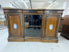 19th cent. Walnut break front bookcase attributed to Lamb of Manchester. Cross boarded top over a