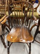 19th cent. Elm seated spindle back carver chair.