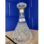 20th cent. Cut glass decanter with silver hallmarked collar. 10½ins.