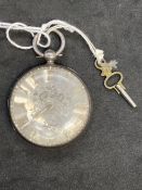 Silver open faced dress pocket watch, silver floral dial with gold Roman numerals.