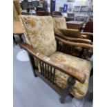 Early 20th cent. Oak adjustable sliding upholstered armchairs, a pair.