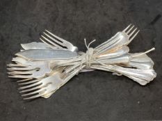 Silver: 800 standard flatware set of six fish eaters with scalloped pattern handles. Weight 17.1oz.