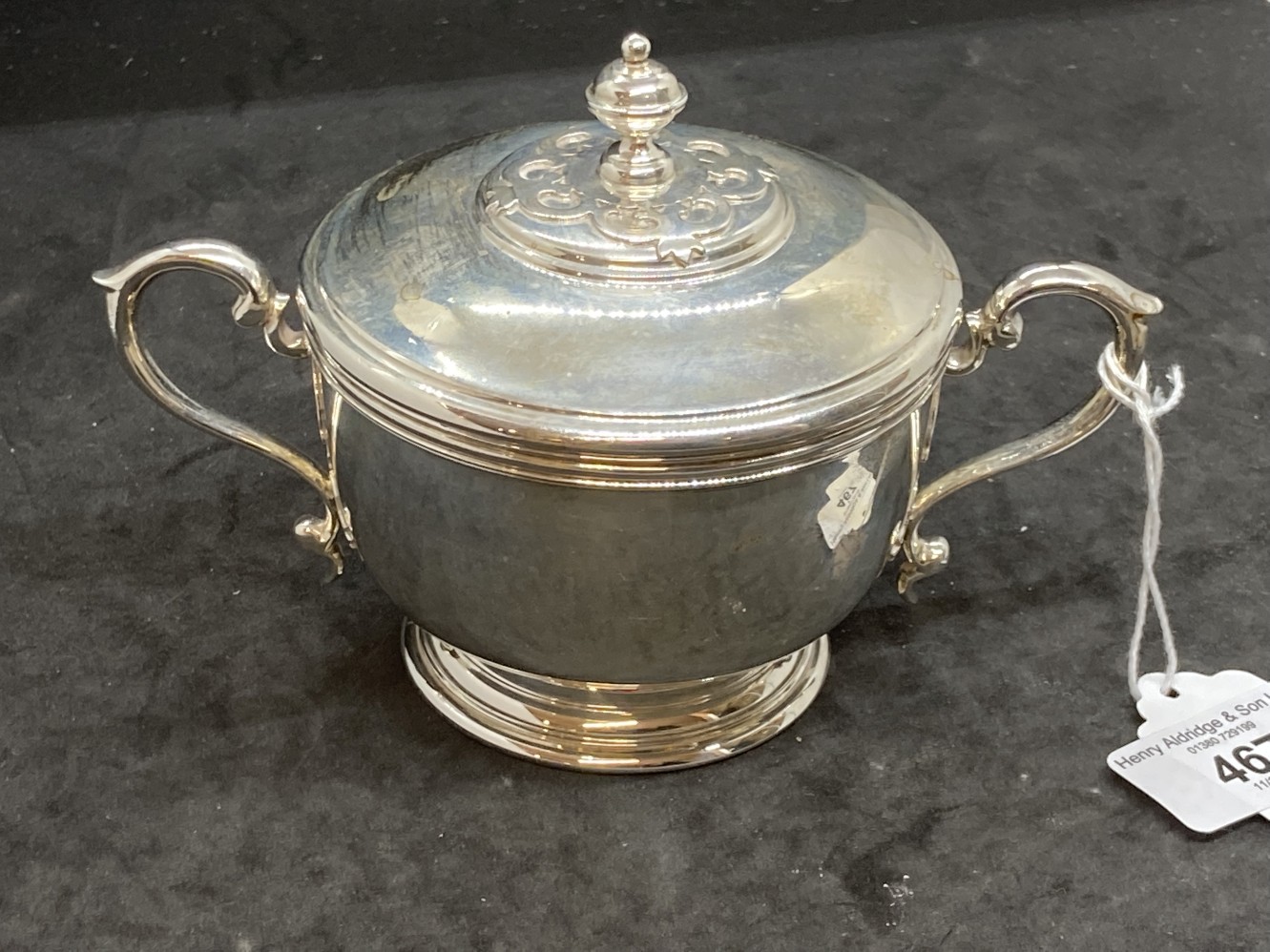 Hallmarked Silver: Sugar bowl with cover and scroll handles. Hallmarked London. Weight. 10oz.