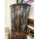 Late 19th cent. Mahogany glazed top bow front corner cupboard, the seventeen pane glass doors