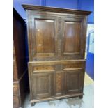 17th cent. Style oak cupboard with foliate carved stiles and inlaid bottom section, with stile feet.