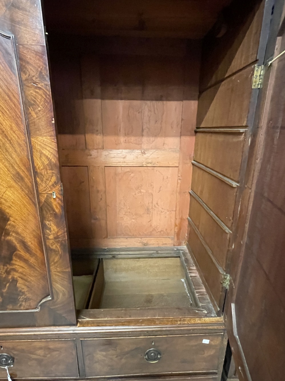 19th cent. Figured mahogany linen press with two over one drawer unit on bracket supports. No trays. - Image 2 of 2