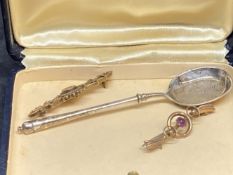 Scrap - yellow gold brooch, weight 2.4g. 9ct gold brooch, weight 1.3g. Silver anointing spoon,