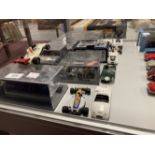 Toys: Collection of boxed and playworn racing cars and bikes including Corgi Shadow Ford, Quartzo,