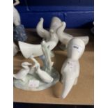 Nao: Four dove figures. Approx. 6ins. - 8ins. Long. Plus a group of geese. (5)