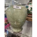 Chinese Longquan celadon vase, the crackle glaze decorated with scrolls to the shoulder and