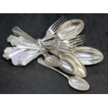 Silver: 800 standard flatware with scalloped pattern handles. Five each of side forks, dinner