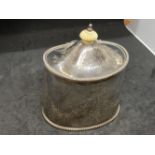 Hallmarked Silver: Tea caddy, hinged cover, engraved leaf and floral decoration. Hallmarked London