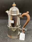Hallmarked Silver: Hot milk jug with hinged cover and scroll handle. Hallmarked Birmingham 1924.