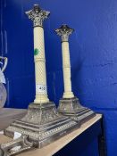 Silver: Pair of hallmarked silver and ivory desk candlesticks, the Corinthian capitols resting on