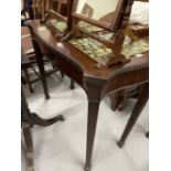 19th cent. Mahogany fold over top card table, the serpentine top on fluted legs terminating in block