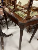 19th cent. Mahogany fold over top card table, the serpentine top on fluted legs terminating in block