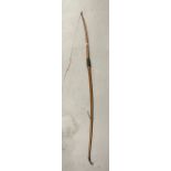20th cent. Yew wood longbow. 75ins.