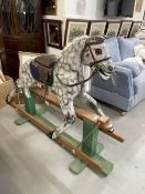 Toys/Hobbies: 1960s dapple grey rocking horse on green painted base. 54ins.