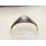 Yellow metal ring set with a single brilliant cut diamond, estimated weight 0.20ct, weight of ring