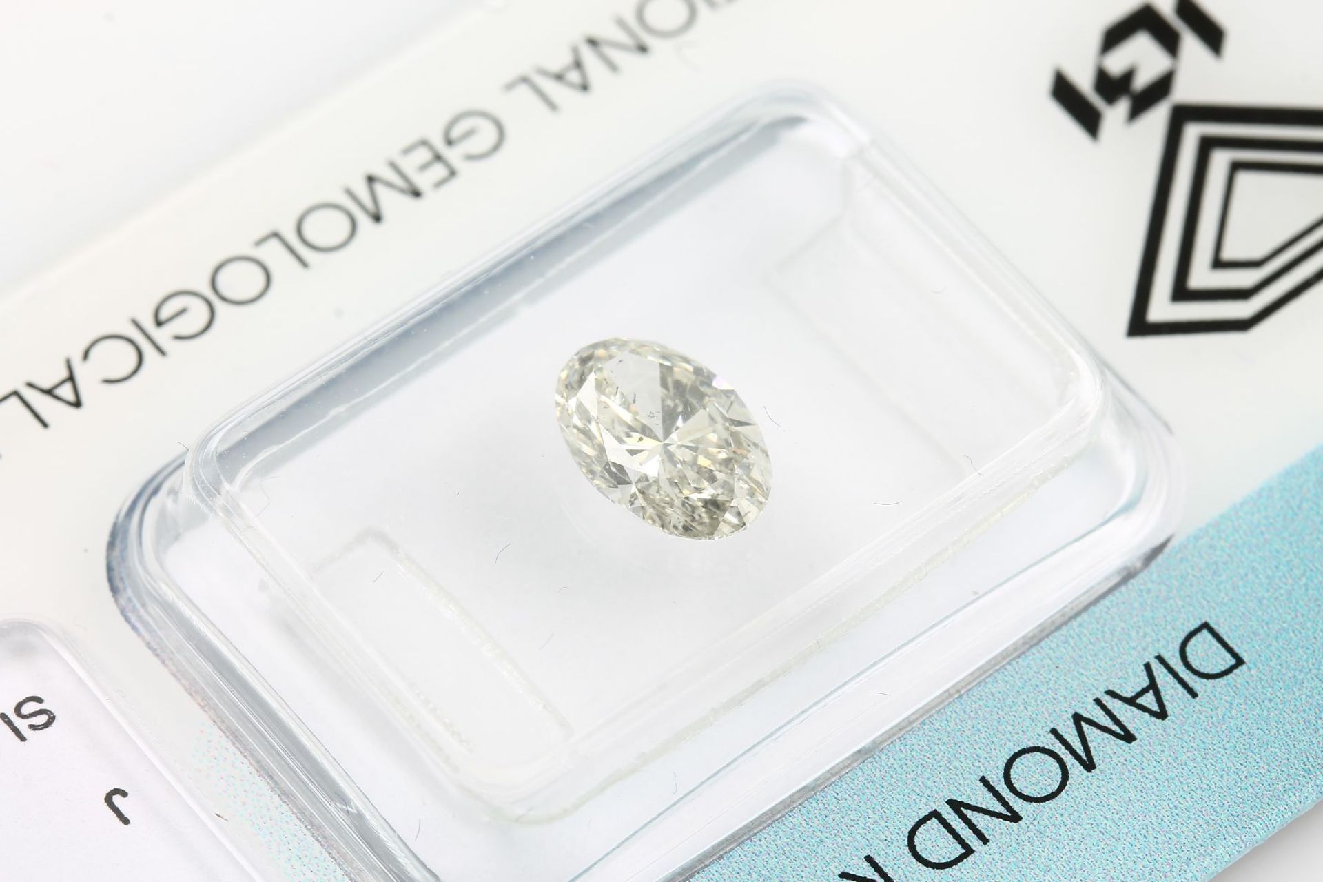 Loser Diamant, 1.01 ct l.get.Weiß (J)/si2, oval facett., - Bild 2 aus 3