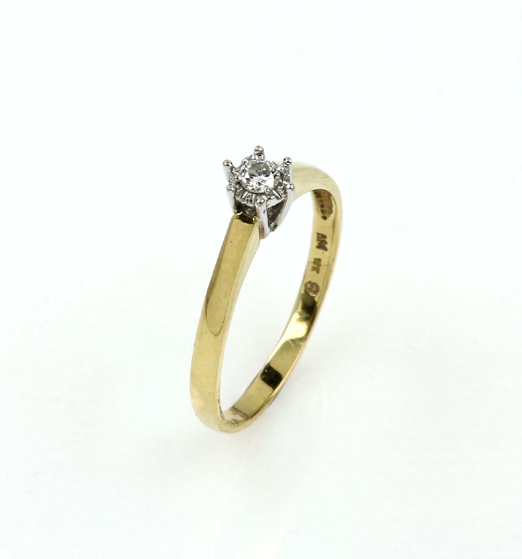 18 kt Gold Ring mit Diamant, GG/WG 750/000,mittig