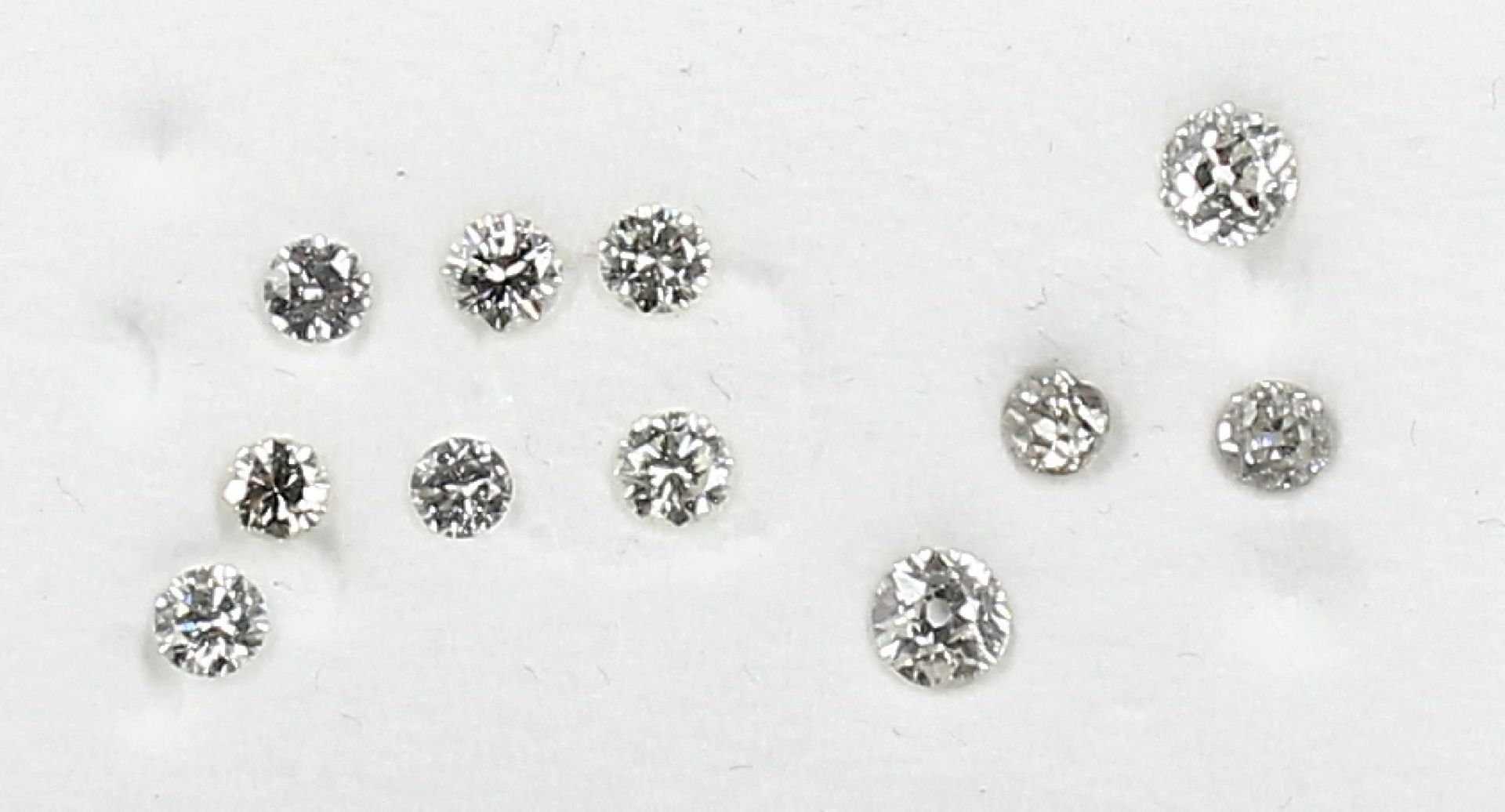 Lot 11 lose Diamanten: 7 Brillanten zus. ca. 1.10 ct