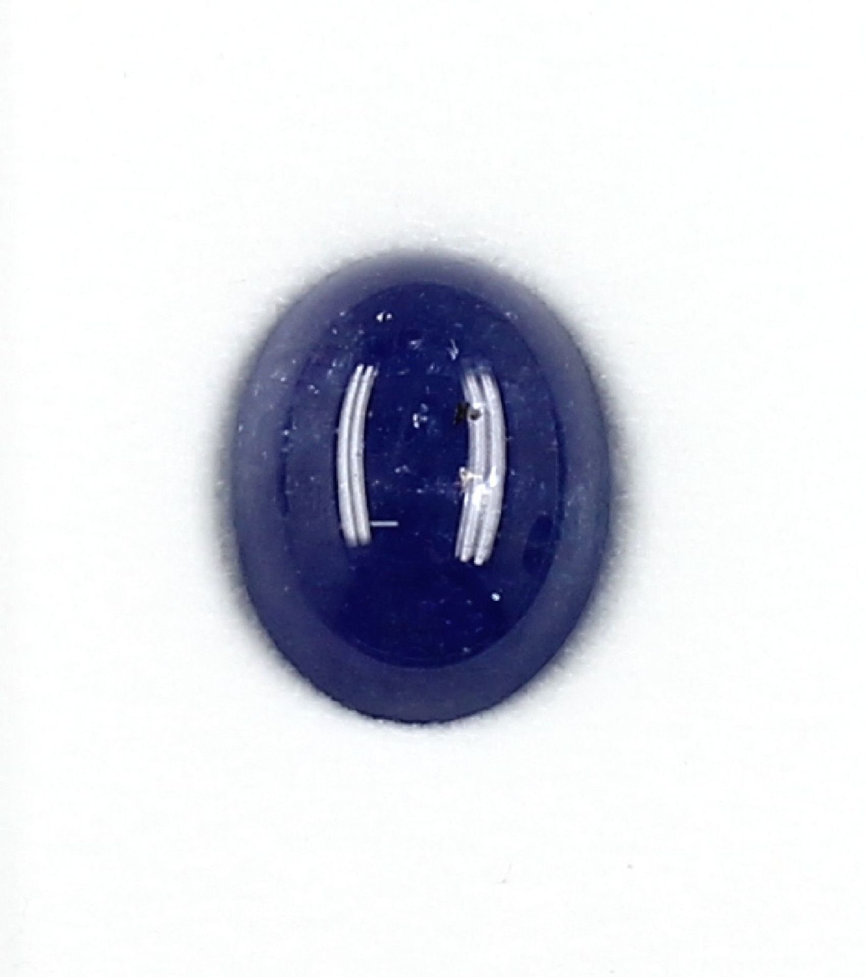 Loser Tansanit, ca. 11.68 ct, ovaler Cabochon, ca.