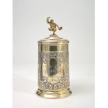 SILVER-GILT TANKARD WITH A LID WITH A DANCING PEASANT FINIAL. Russia, Saint [...]