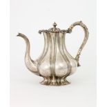 SILVER-GILT LOBED TEAPOT AND SUGAR BOWL ADORNED WITH EMBOSSED FLORAL DECOR Assay [...]