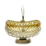 SILVER-GILT CANDY DISH DECORATED WITH A HANDLE, DECORATED WITH CONVEX «SPOONS» AND [...]