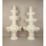 A PAIR OF CARVED WHITE JADEITE PERFUME BURNERS, FIRST HALF OF THE 20TH CENTURYConsisting of three