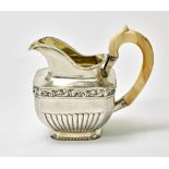 PARCEL-GILT SILVER MILK JUG WITH A BONE HANDLE Unidentified master « ?..», Russia, 1846 (during